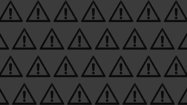 Grungy charcoal warning triangle pattern forms a seamless loop.