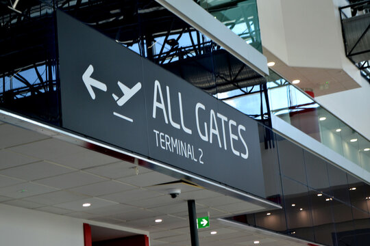 All gates terminal two directional sign in modern airport departure hall for wayfinding banner and travel design. Prague airport