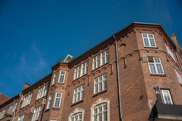 Fototapeta premium Stunning Architectural Facades Under a Clear Blue Sky