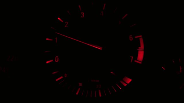 red illuminated car tachometer gauge showing engine revolutions per minute, automotive performance, racing, dashboard speed sensor, vehicle diagnostics