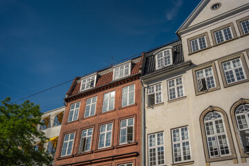 Fototapeta premium Stunning Architectural Facades Under a Clear Blue Sky