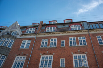 Fototapeta premium Stunning Architectural Facades Under a Clear Blue Sky