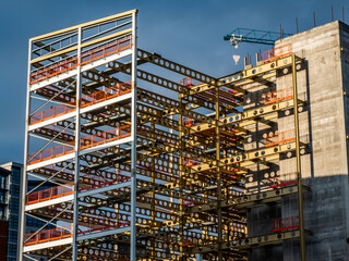 Steel frame superstructure and concrete core under construction for a multi storey building development © Philip