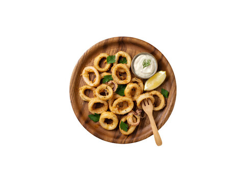 Delicious fried calamari rings served with lemon and dipping sauce transparent background