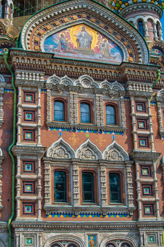 Ornate mosaic tympanum and brick facade of Church of the Savior on Blood with copy space