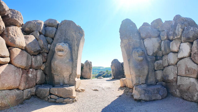 Stone lions flank the ancient Lion Gate entrance set into cyclopean masonry at Hattusa, the historic Hittite capital in Turkey.