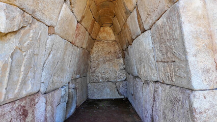 Hieroglyphic inscriptions adorn the corbelled stone vaulted interior of Chamber 2 at Hattusa's ancient Hieroglyphic Chamber site in Turkey. © Tarik GOK