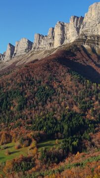 The Vercors Massif range with mountain peaks in autumn (aerial view). Morning ligh in Vercors Regional Natural Park, Isere, Rhone-Alpes, Alps, France