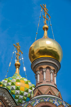 Golden and patterned domes of Church of the Savior on Blood with blue sky copy space