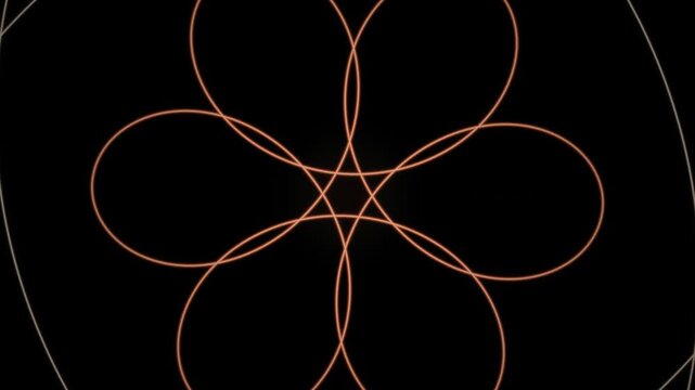 Intricate orange line art forms a symmetrical floral pattern against a black background