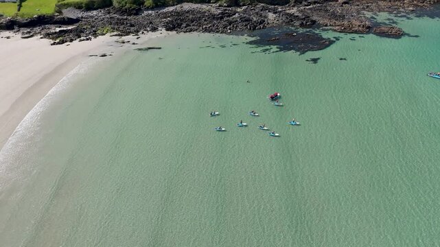 Aerial view of a Standup Paddle group at Narin Beach by Portnoo in County Donegal, Ireland