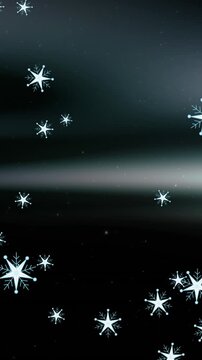 Animation of snow falling at christmas over aurora