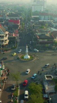 Aerial view of Tugu Yogyakarta landmark and surrounding city intersection