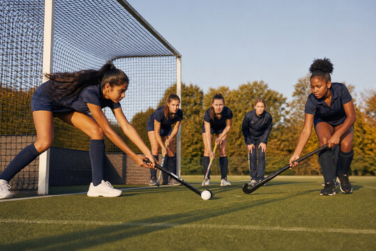 Girls Field Hockey Team Practicing Penalty Corner