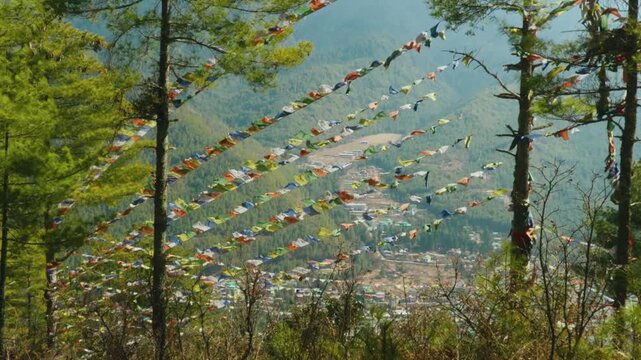 Buddhist Prayer Flags Fluttering in Slow Motion Over Thimphu Valley, Bhutan