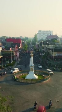 Iconic Tugu Yogyakarta monument centered in historic city roundabout