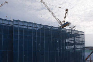Construction building crane scaffolding architecture urban development industrial structure sky © pirom