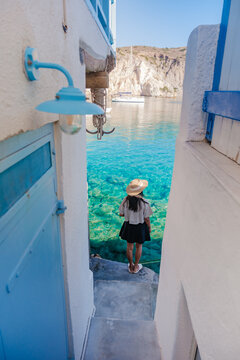 Stunning views of Firopotamos beach in Milos, Greece with clear turquoise waters