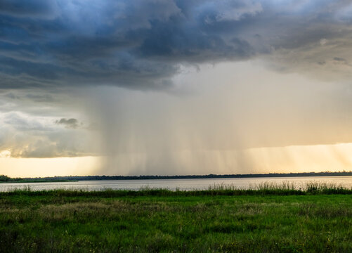 Rain storm over Upper Myakka Lake in Myakka River State Park in Sarasota USA