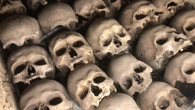 Countless human skulls and bones lying together in the catacombs of the san francisco monastery