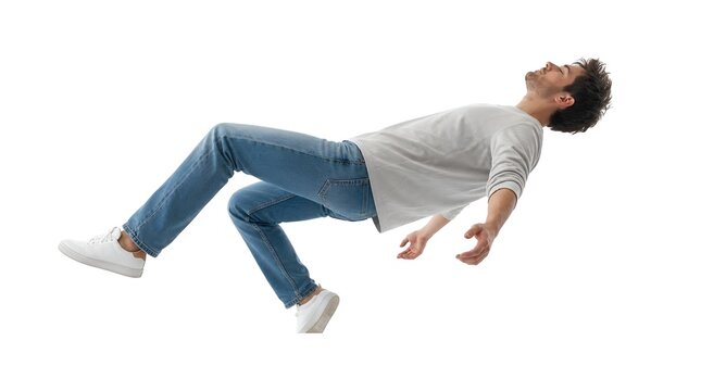 Young man levitating in casual clothing isolated on white
