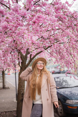 girl`s portraite at sakura © Oksana