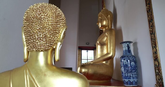 Golden buddha statue in pagoda temple Wat Suthat Thepwararam sightseeing travel in Bangkok Thailand