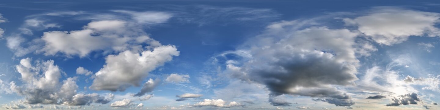 360 hdri blue sky with beautiful clouds with halo like a seamless panorama view with zenith for use in 3d graphics or game development as sky dome or edit drone shot