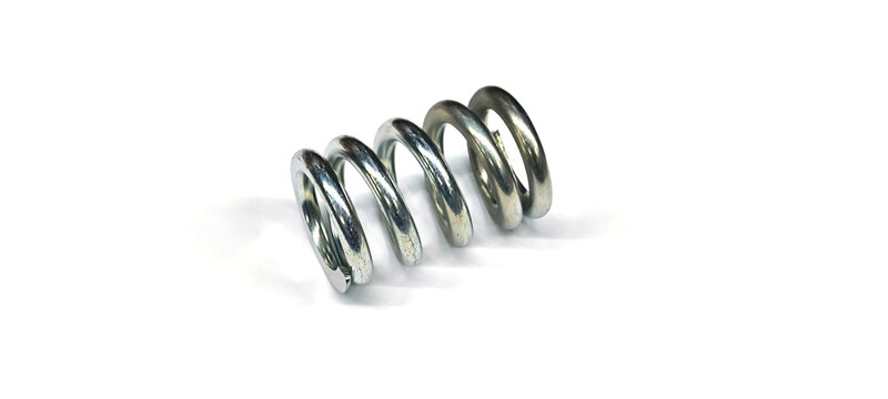 A spring is a device made of metal coiled into a loop. It has the property of being elastic and returning to its original shape when a force is applied.