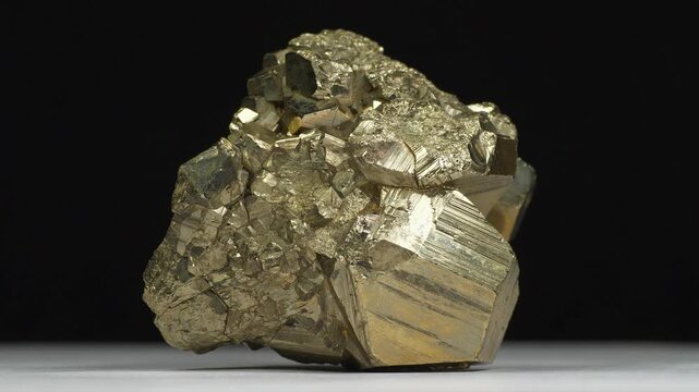 Pyrite - mineral, shiny iron sulfide in natural crystal form, also known as fools gold