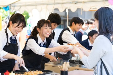 Fototapeta premium 学園祭の模擬店で接客する学生たち素材