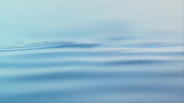 Iridescent Liquid Surface Shifting Through Soft Hues with Gentle Ripples and Light Reflections. Abstract Motion Background with Fluid Transitions.