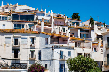 Fototapeta premium Whitewashed Mediterranean Buildings with Terracotta Roofs in Cadaqués, Costa Brava, Spain