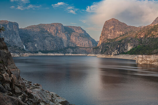 Beautiful scenic view of Hetch Hetchy Reservoir with Kolana Rock and Wapama Falls in Yosemite