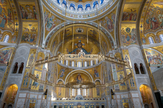 Golden mosaics and chandelier inside Saint Sava Temple, Belgrade