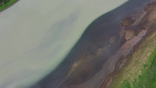 Stora Laxa, Iceland - Glacial water and clear mountain water meet close up