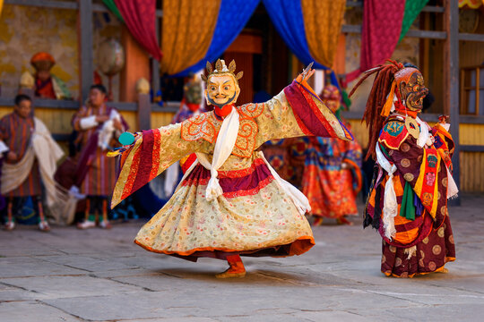 Bumthang in Bhutan, at the yearly festival in the monastery of Jakar. A monk is dancing in his colourful traditional dress and mask