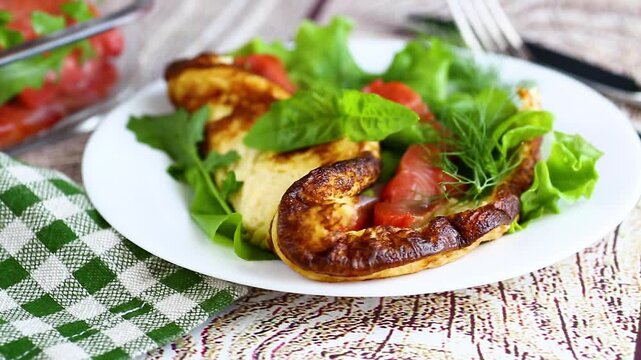 Gourmet omelet with smoked salmon served on wooden table