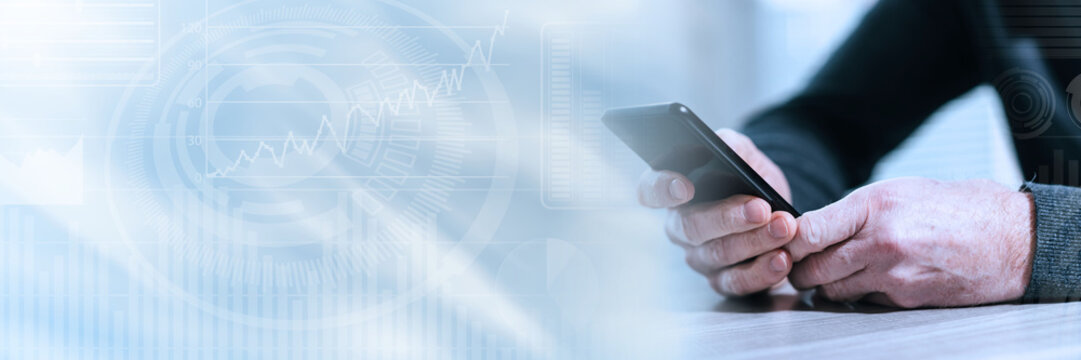 Male hands using a smartphone; panoramic banner