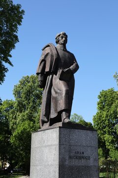 GLIWICE, POLAND - MAY 11, 2021: Adam Mickiewicz national poet memorial monument in Gliwice city in Poland. The memorial by artist Franciszek Strynkiewicz was unveiled in public space in 1957.