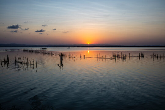 A beautiful sunset over La Albufera Natural Park in Valencia, Spain