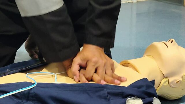 CPR Training ,Emergency and first aid class on cpr doll, Cardiopulmonary resuscitation, One part of the process resuscitation on unconscious person.