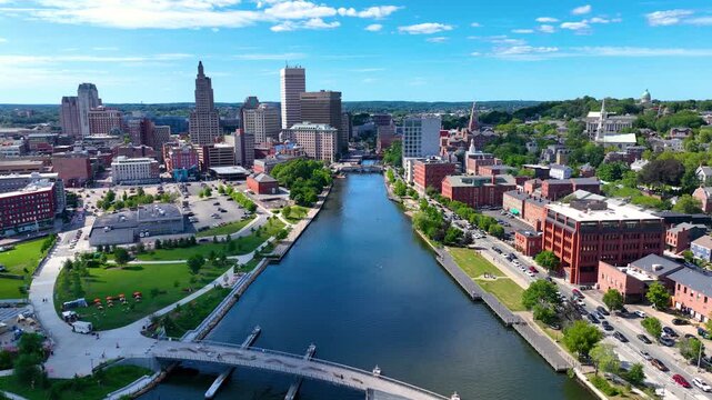 Providence River aerial view including Michael S. Van Leesten Memorial Bridge, with modern city skyline at the background, downtown Providence, Rhode Island RI, USA.