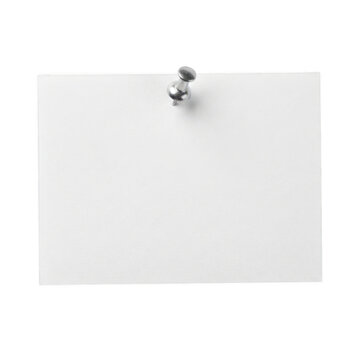 Blank white paper note pinned with a silver push pin