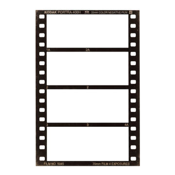 Vintage 35mm film strip with four empty frames