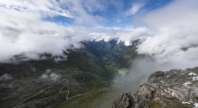 Famous curvy mountain road Fylkesvei 63 or Geirangervegen, which leads from Geiranger to the Djupvasshytta plateau, view of the Geiranger fjord from the 1476 meter high mountain peak and viewpoint Dalsnibba, Stranda, M&oslash;re og Romdal, Norway
