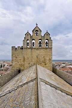 Bell tower of the Notre-Dame-de-la-Mer Roman Catholic Church, Saintes-Maries-de-la-Mer, Camargue, southern France, France