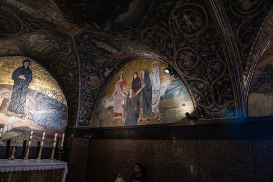 Numerous religious decorations in Hall of a Genuflection before Calvary in Church the Holy Sepulchre in Jerusalems Old City in Israel