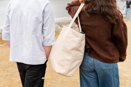 clothing detail casual couple walking blank tote bag