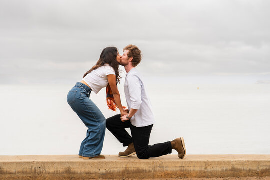 marriage proposal engagement kiss kneeling
